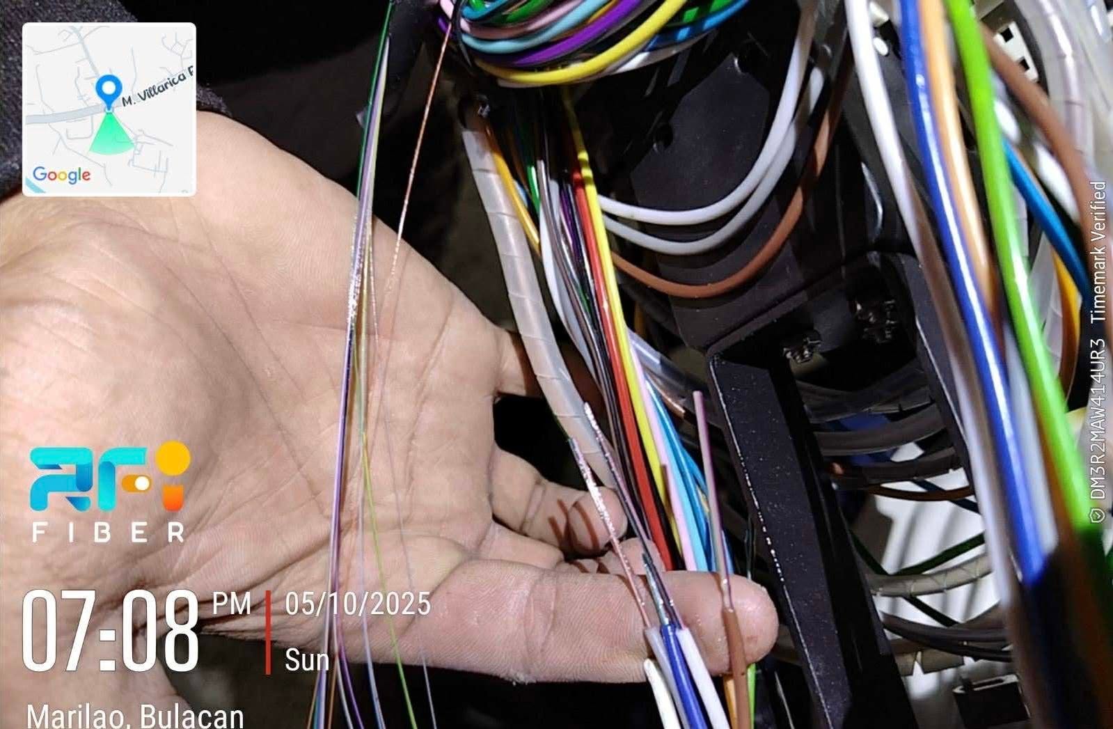 RFi Fiber technician doing fiber cable installation in Marilao, Bulacan